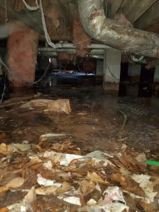 Crawl space flood assessment for Commercial Water Damage Restoration in Sutton